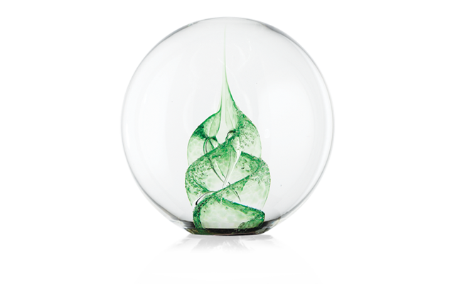 Clear paperweight with a beautiful green spiral through the middle