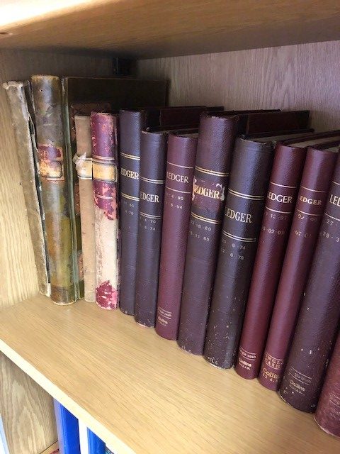 Collection Of Old Books On Shelves